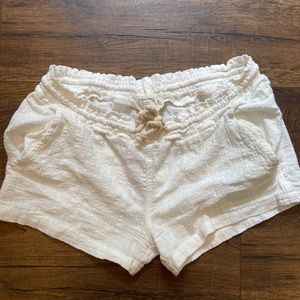 White beach shorts